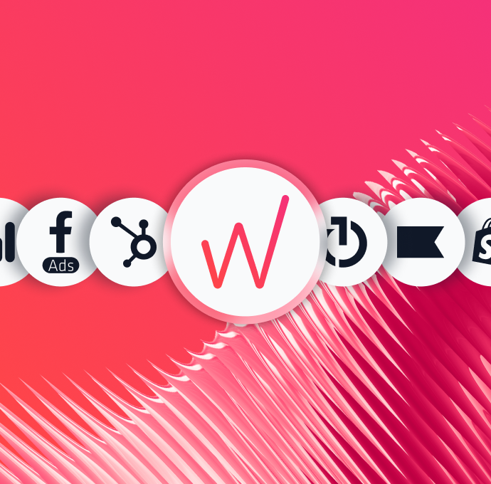 Whatagraph native integrations showing channel logos including Google Ads, Facebook, HubSpot and Shopify.